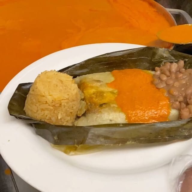 Tamal with mole sauce