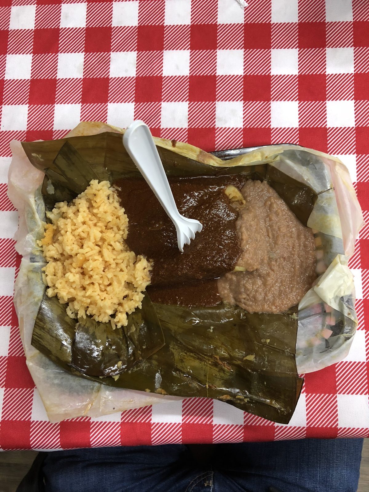 Tamal plate on a checkered tablecloth