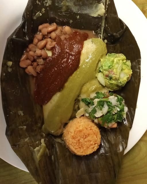 Banana-leaf tamal with rice and beans
